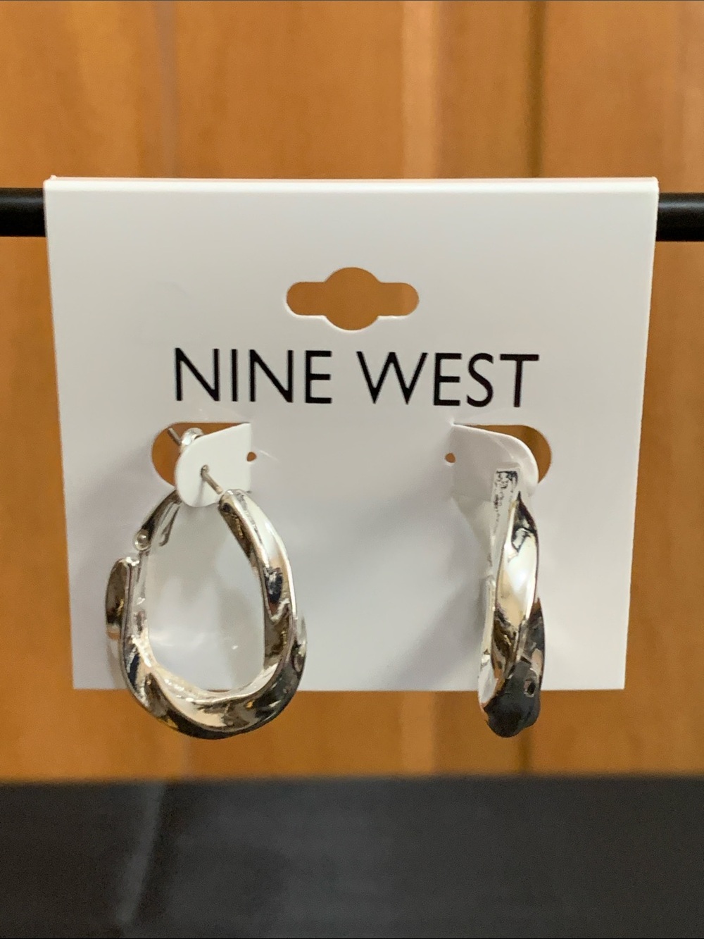 NWT Nine West silver tone twisted hoop earrings